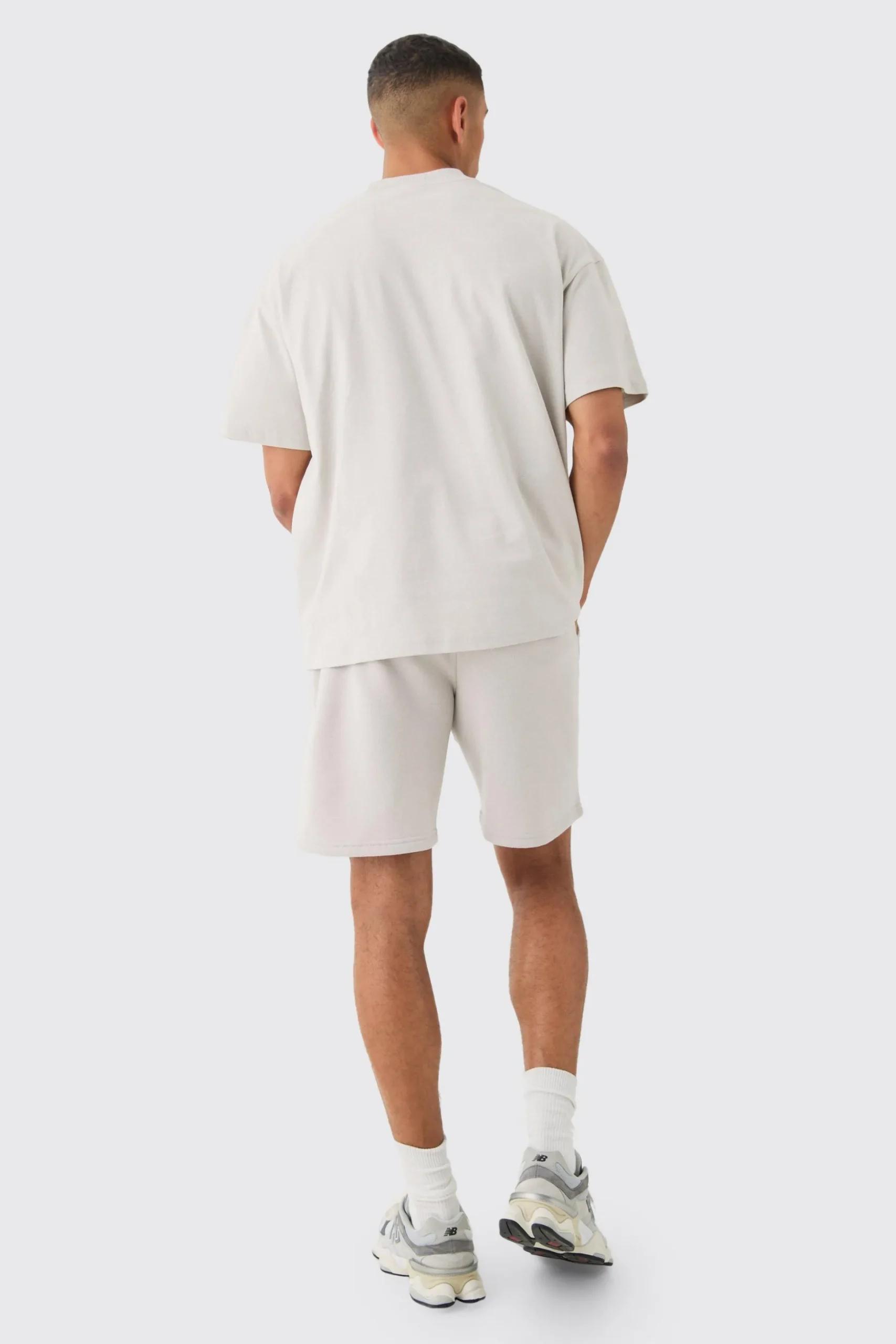 Oversized Extended Neck Official Embossed T-shirt & Short Set | BoohooMAN UK