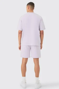 Oversized Extended Neck Official Embossed T-shirt And Relaxed Short Set | BoohooMAN UK