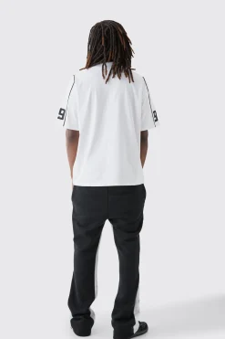 Oversized Extended Neck Universal Graphic T-shirt | BoohooMAN UK