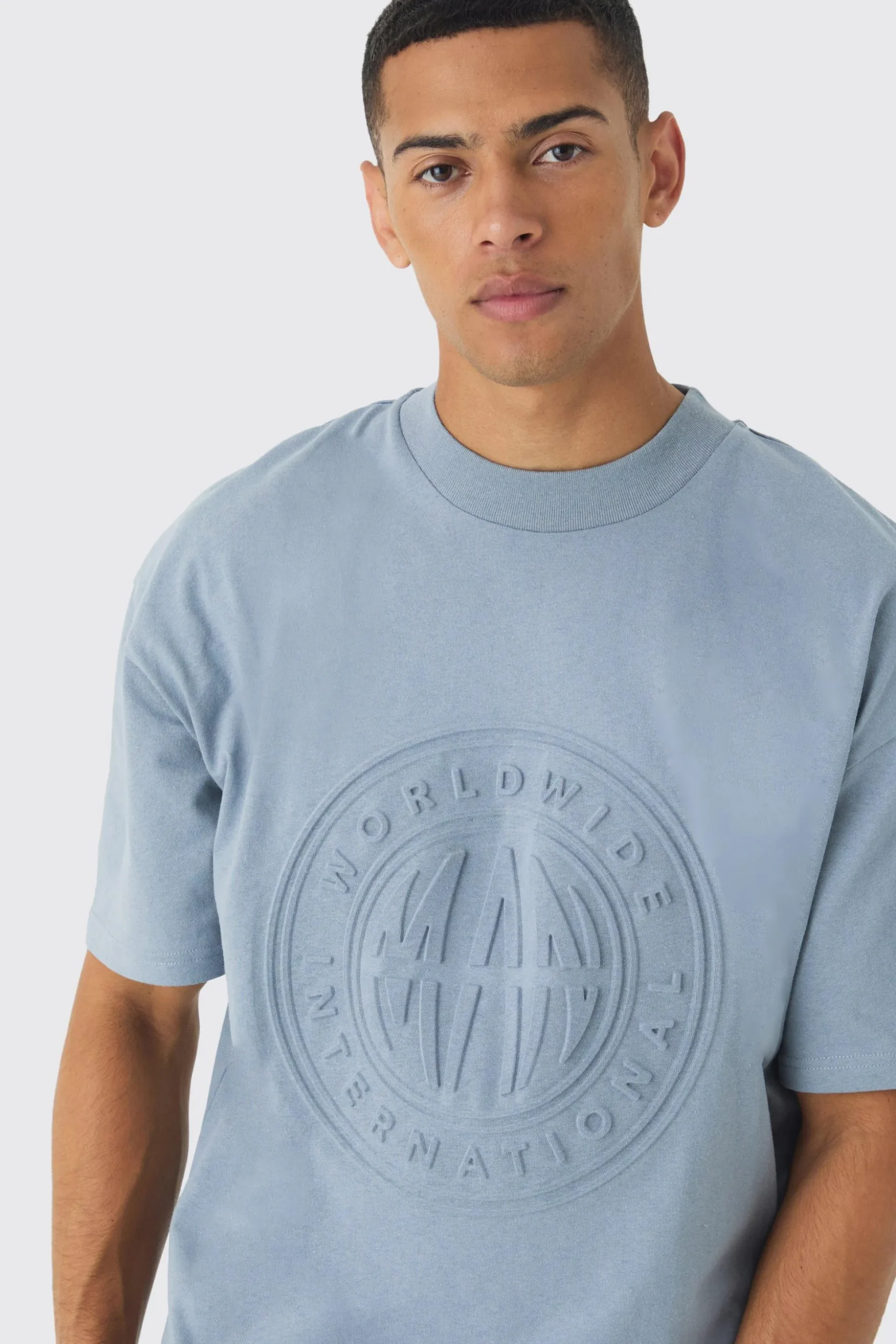 Oversized Extended Neck Worldwide Embossed T-Shirt | BoohooMAN UK