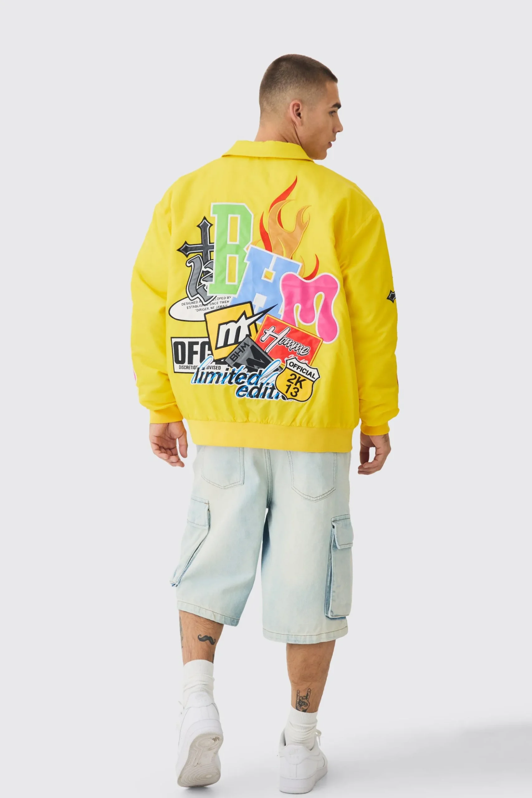 Oversized Multi Badge Nylon Varsity Bomber Jacket In Yellow | BoohooMAN UK