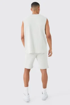 Oversized OFCL Dept Rib Printed Tank & Shorts Set | BoohooMAN UK