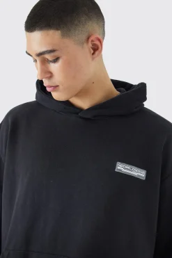 Oversized Washed Loopback Rubber Badge Hoodie | BoohooMAN UK