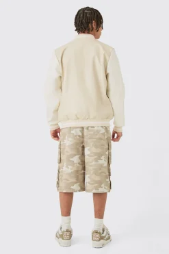 Plain PU Varsity Jacket In Beige | BoohooMAN UK