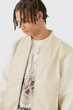 Plain PU Varsity Jacket In Beige | BoohooMAN UK