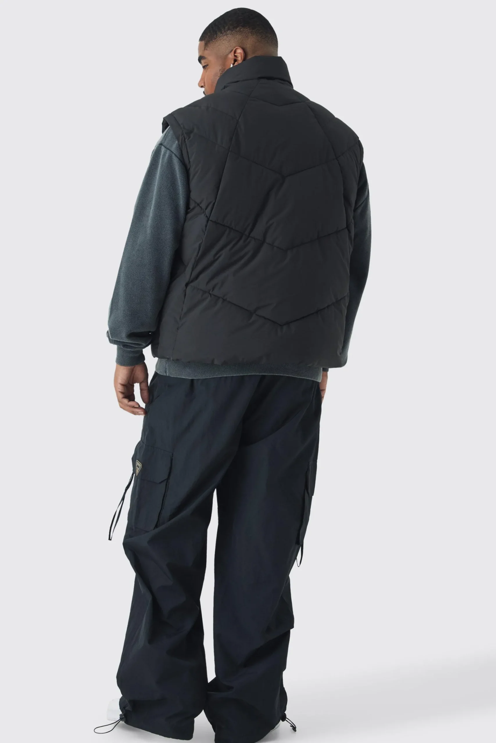 Plus Abstract Quilted Funnel Neck Gilet In Black | BoohooMAN UK