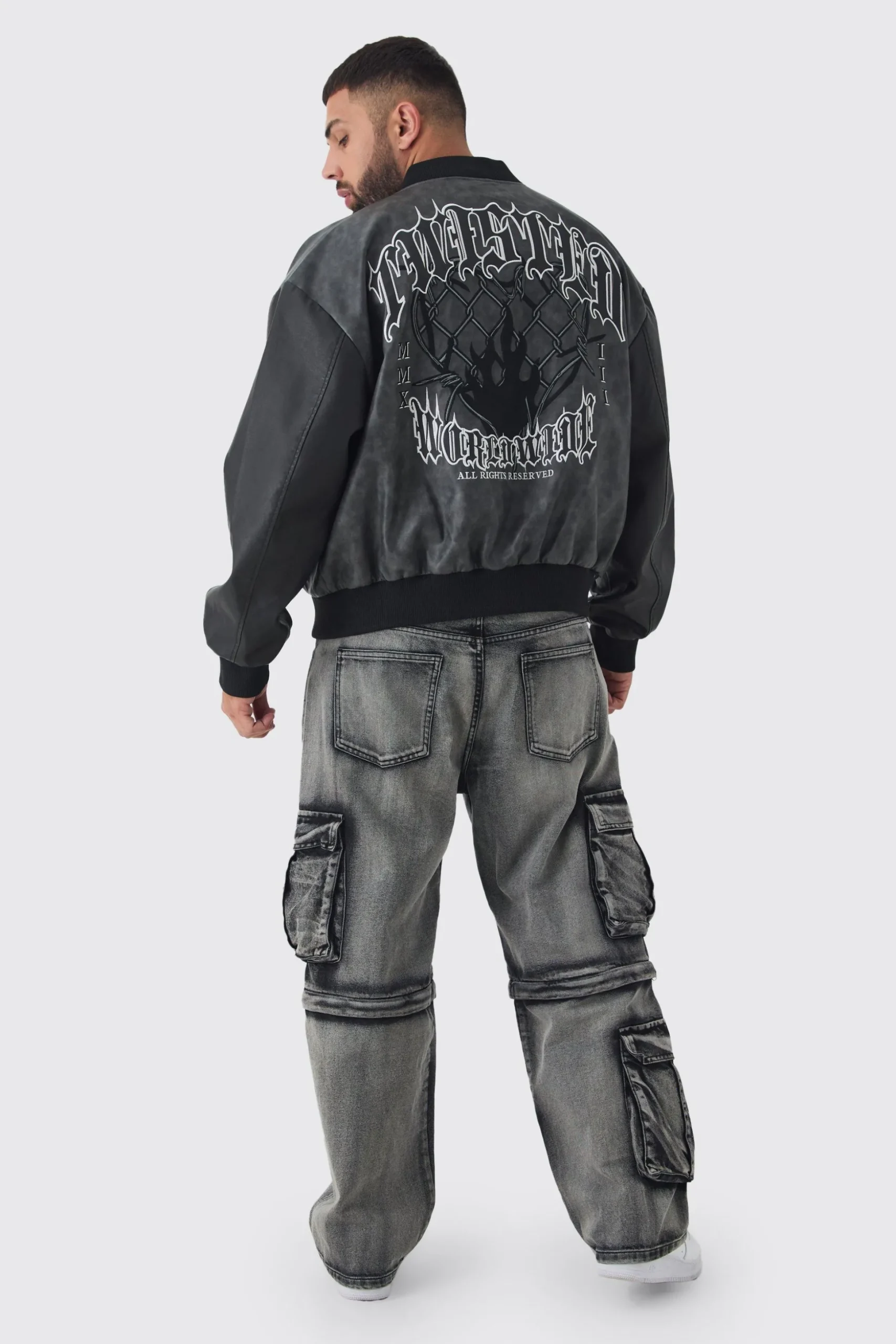 Plus Boxy Tonal Badge Tumbled PU Varsity Jacket In Black | BoohooMAN UK