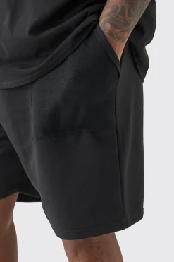 Plus Loop Back Reverse Pocket Detail Relaxed Short In Black | BoohooMAN UK
