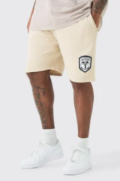 Plus Loose Fit Team Ofcl Short In Sand | BoohooMAN UK