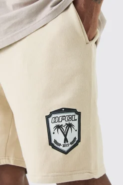 Plus Loose Fit Team Ofcl Short In Sand | BoohooMAN UK
