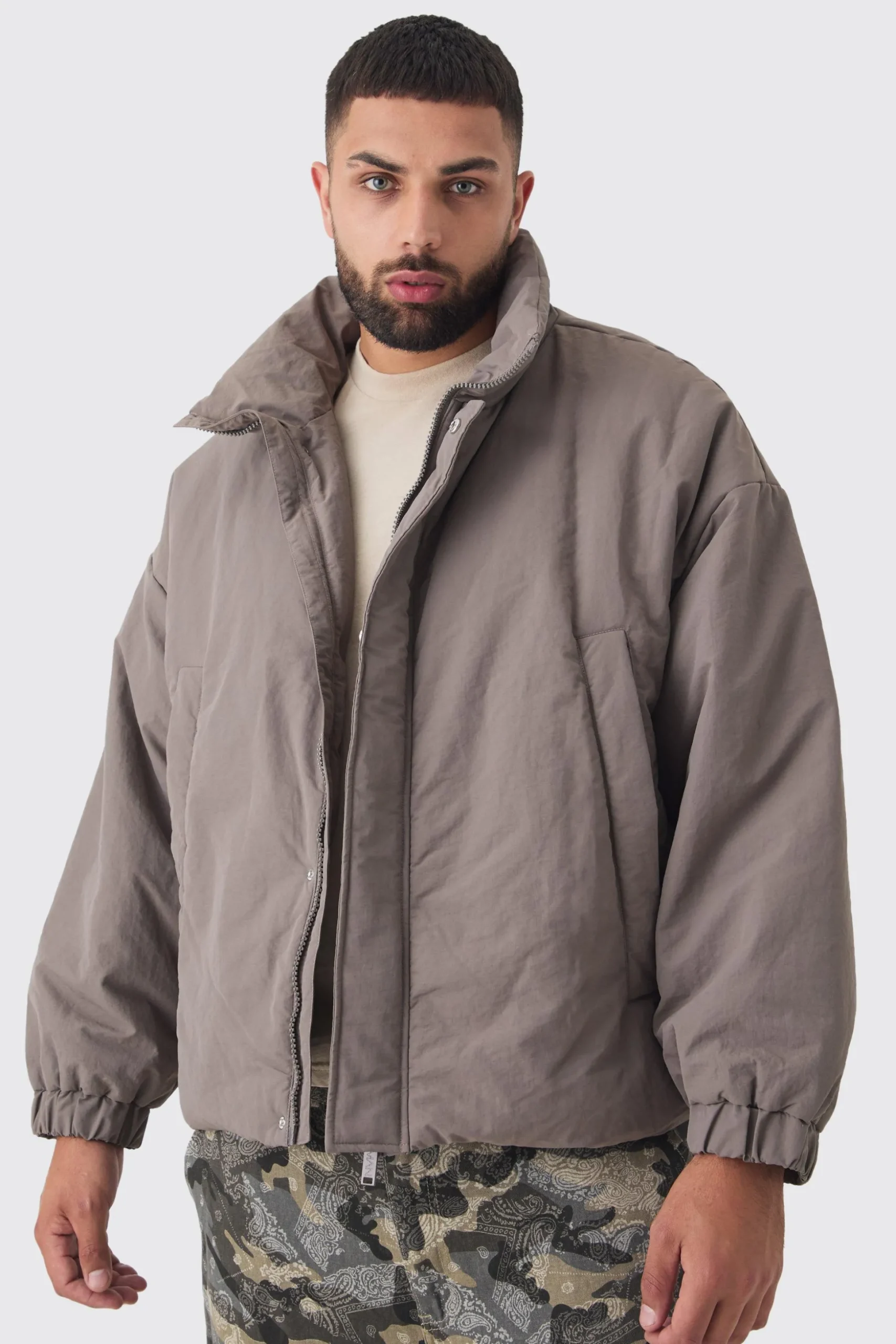 Plus Oversized Boxy Padded Funnel Neck Coat In Charcoal | BoohooMAN UK