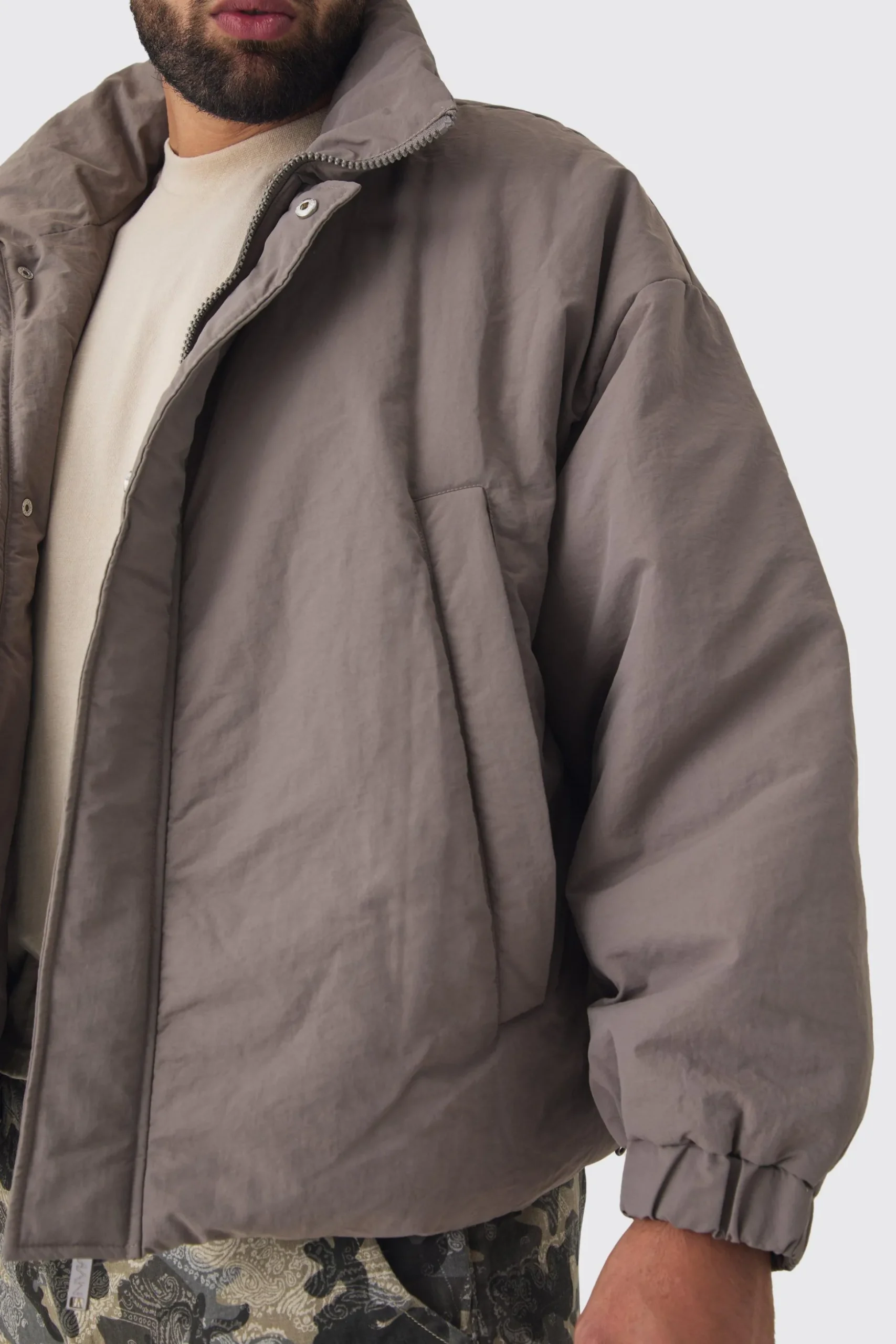 Plus Oversized Boxy Padded Funnel Neck Coat In Charcoal | BoohooMAN UK