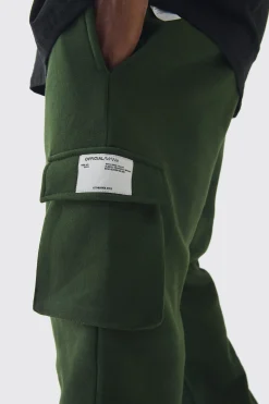 Plus Skinny Fit Extreme Stacked Woven Tab Cargo Jogger | BoohooMAN UK
