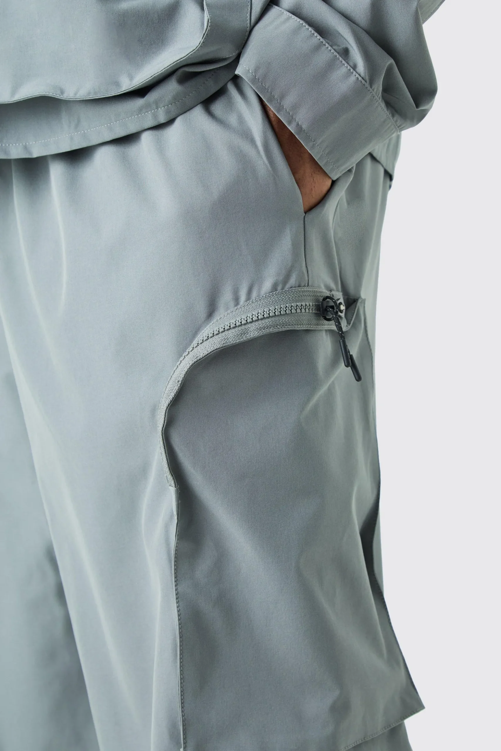 Plus Technical Stretch Elasticated Waist Zip Cargo Trouser | BoohooMAN UK