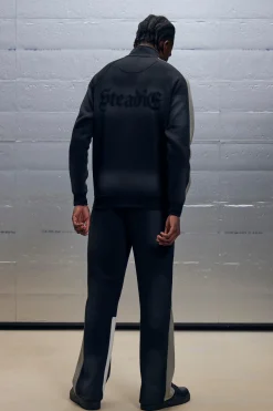 Regular Fit Gusset Panel Washed Stencil Spray Joggers | BoohooMAN UK