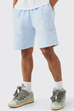 Relaxed All Over Pocket Spray Wash Shorts | BoohooMAN UK