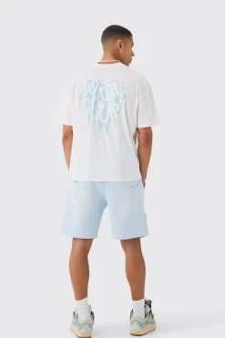 Relaxed All Over Pocket Spray Wash Shorts | BoohooMAN UK