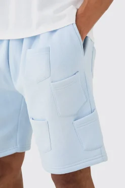 Relaxed All Over Pocket Spray Wash Shorts | BoohooMAN UK