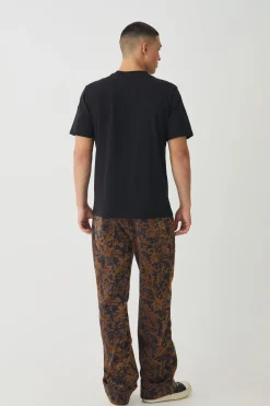 Relaxed Fit Abstract Flock Turn Up Hem Jeans | BoohooMAN UK