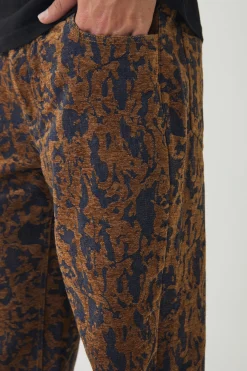Relaxed Fit Abstract Flock Turn Up Hem Jeans | BoohooMAN UK