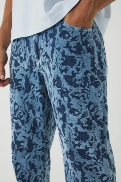 Relaxed Fit Abstract Flock Turn Up Hem Jeans | BoohooMAN UK