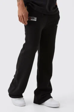 Relaxed Fit Flared Varsity Woven Tab Jogger | BoohooMAN UK