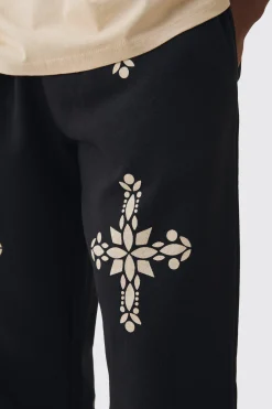 Relaxed Fit Gothic Cross Print Jogger | BoohooMAN UK