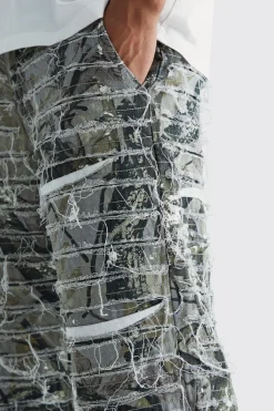 Relaxed Heavily Distressed Camo Trouser | BoohooMAN UK
