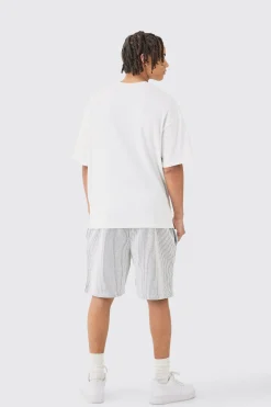 Relaxed Mid Length Textured Short With Woven Tab | BoohooMAN UK