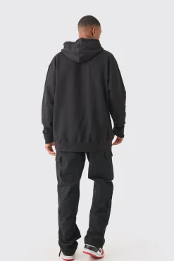 Relaxed Multi Cargo Ripstop Trouser With Woven Tab | BoohooMAN UK