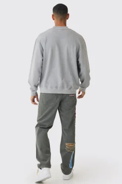 Relaxed Rigid Applique Badge Ripped Jeans | BoohooMAN UK