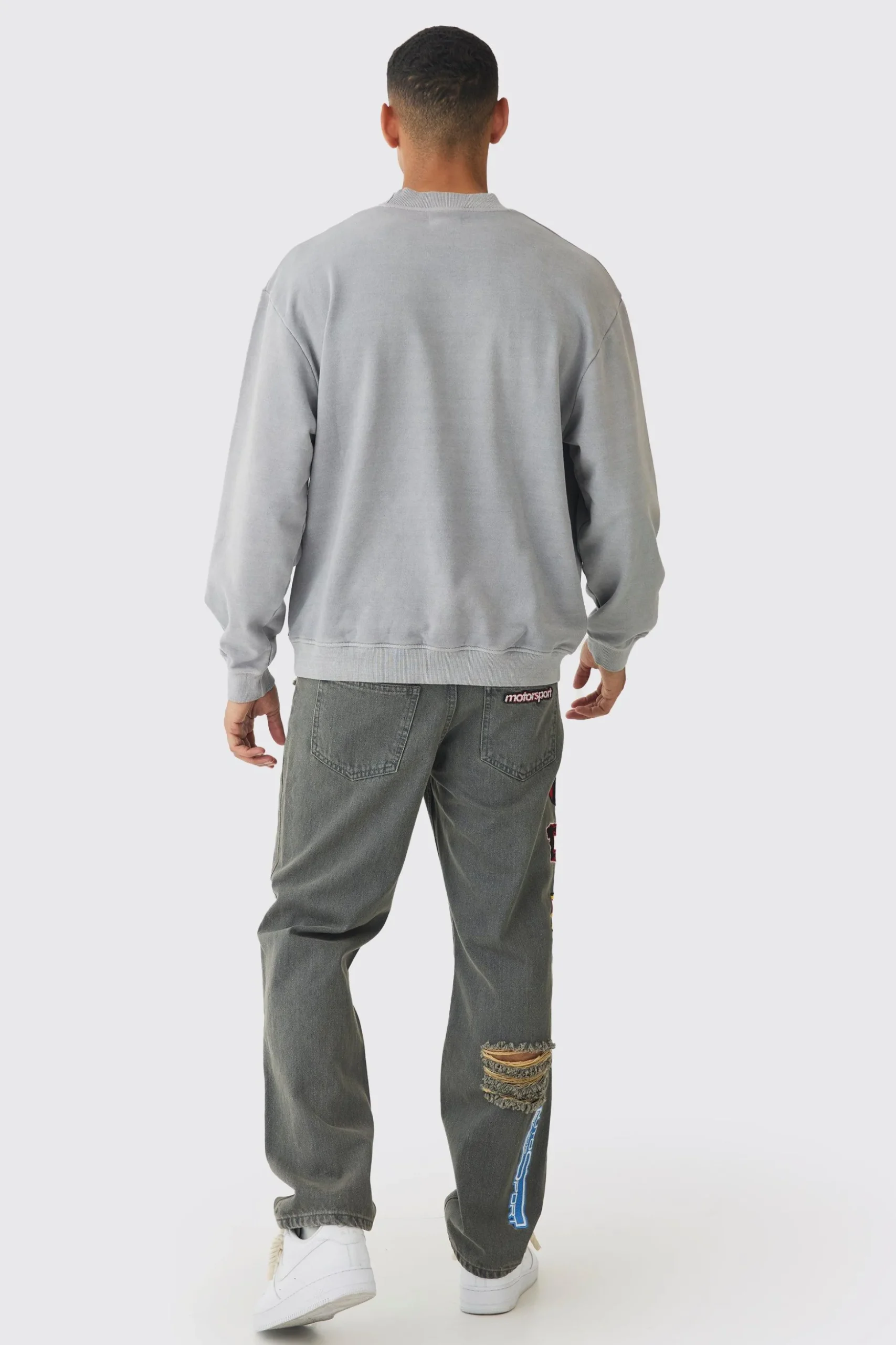 Relaxed Rigid Applique Badge Ripped Jeans | BoohooMAN UK