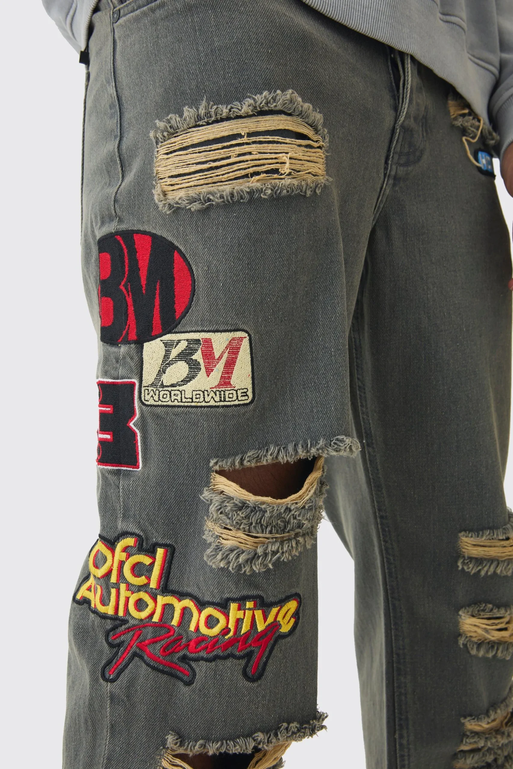 Relaxed Rigid Applique Badge Ripped Jeans | BoohooMAN UK