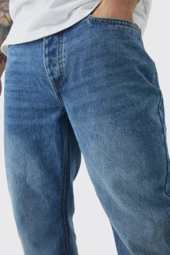 Relaxed Rigid Flare Jean In Mid Blue | BoohooMAN UK