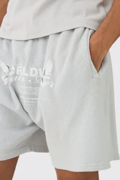 Relaxed Washed Heavyweight Graphic Waffle Shorts | BoohooMAN UK