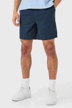 Shorter Length Relaxed Fit Elasticated Waist Chino Shorts In Navy | BoohooMAN UK