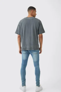 Skinny Fit All Over Ripped Jeans | BoohooMAN UK