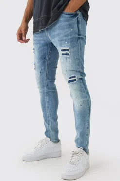 Skinny Fit Rip & Repair Paint Splatter Jeans | BoohooMAN UK