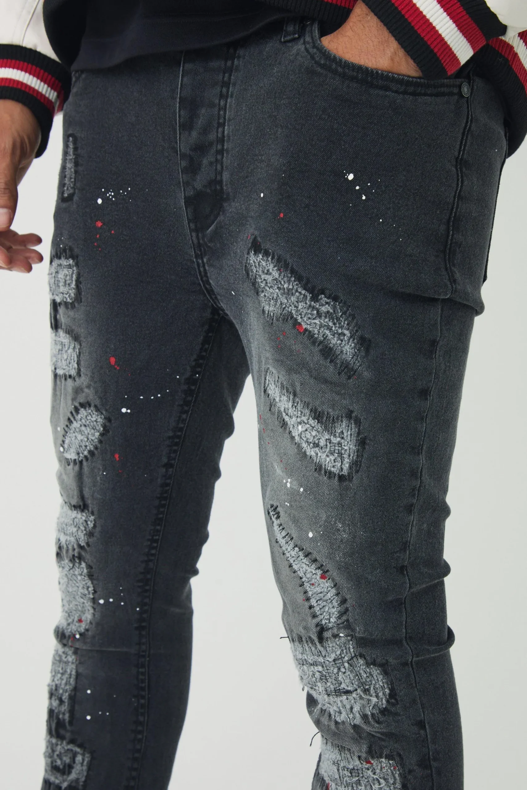 Skinny Flared Ripped Stitch Detail Paint Splatter Jeans | BoohooMAN UK