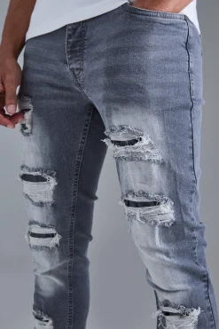 Skinny Stacked Distressed Ripped Jeans In Grey | BoohooMAN UK