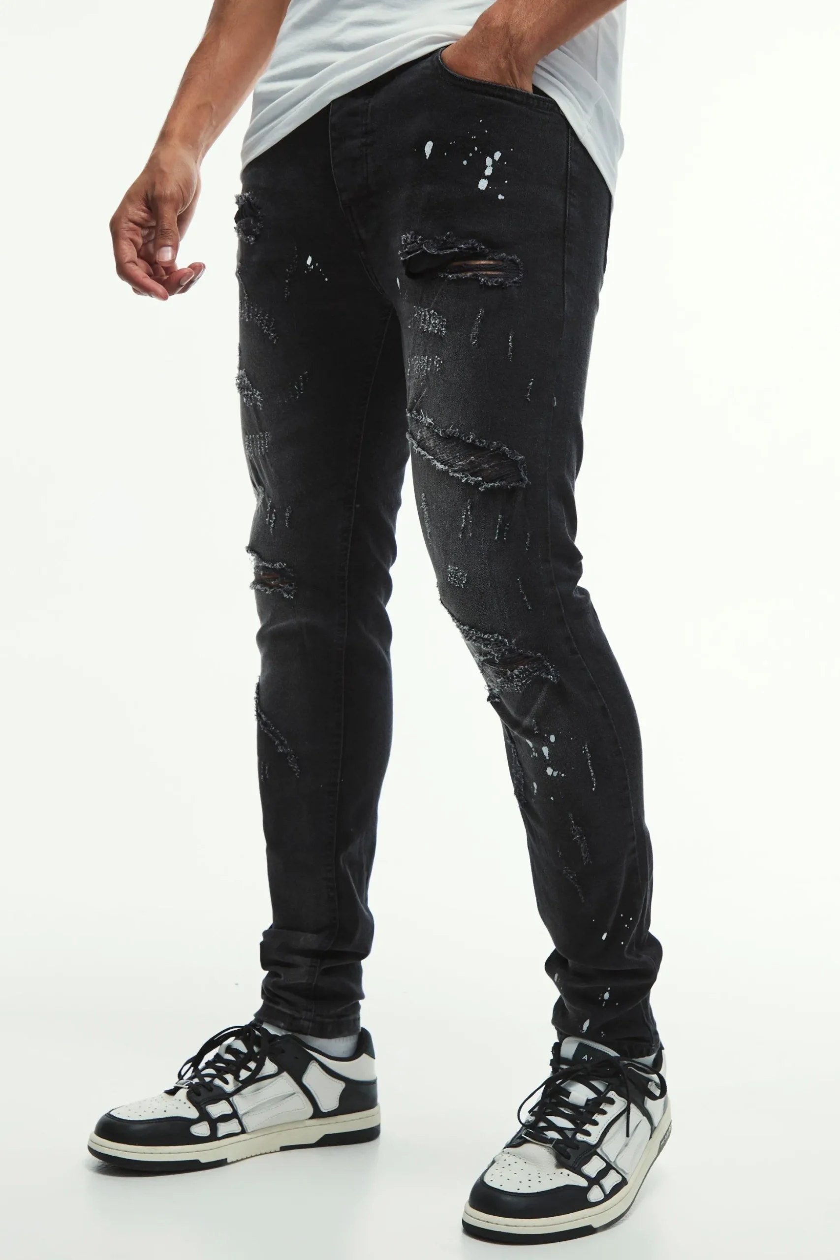 Skinny Stretch All Over Rip & Repair Paint Splatter Jeans | BoohooMAN UK