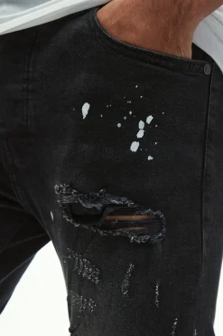 Skinny Stretch All Over Rip & Repair Paint Splatter Jeans | BoohooMAN UK