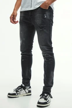 Skinny Stretch Knee Rip Paint Splatter Jeans | BoohooMAN UK