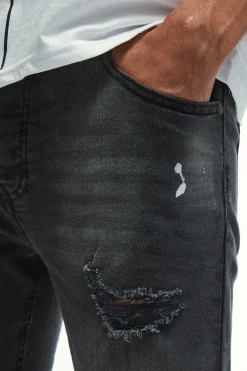 Skinny Stretch Knee Rip Paint Splatter Jeans | BoohooMAN UK