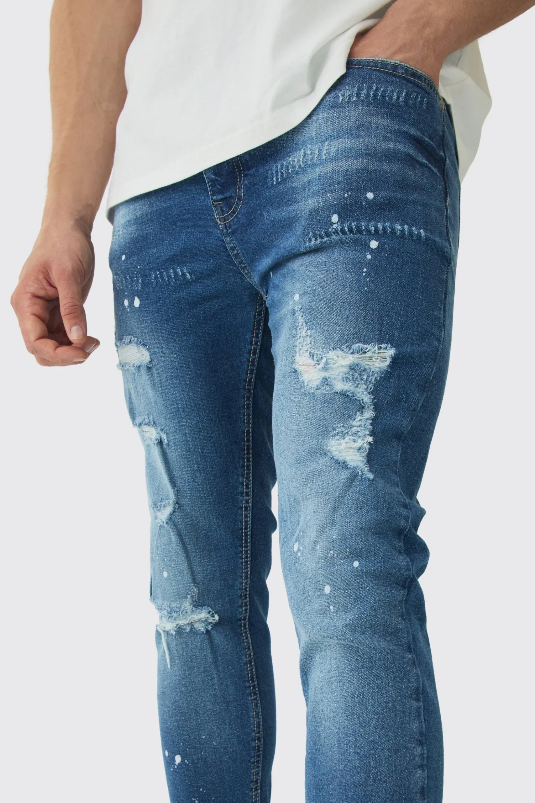 Skinny Stretch Rip & Repair Paint Splatter Jeans | BoohooMAN UK