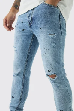 Skinny Stretch Rip & Repair Paint Splatter Jeans | BoohooMAN UK