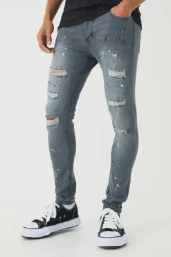Skinny Stretch Rip & Repair Paint Splatter Jeans | BoohooMAN UK