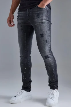 Skinny Stretch Stacked Ripped Carpenter Zip Hem Jeans In Black | BoohooMAN UK