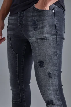 Skinny Stretch Stacked Ripped Carpenter Zip Hem Jeans In Black | BoohooMAN UK