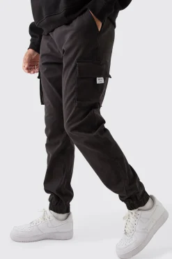 Slim Fit Elasticated Waist Woven Tab Cuffed Cargo Trousers | BoohooMAN UK